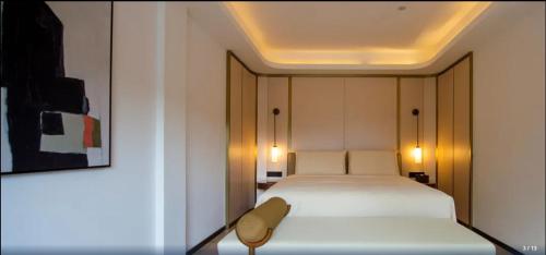 Katil atau katil-katil dalam bilik di Xishang Yunjian Holiday Hotel