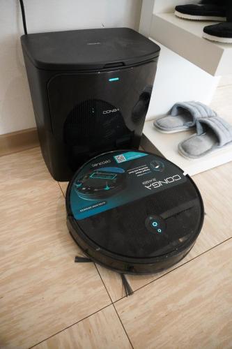 Televisyen dan/atau pusat hiburan di M House Do Modernes Privatzimmer mit Balkon & Self Check-in