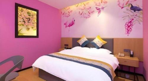 Ένα ή περισσότερα κρεβάτια σε δωμάτιο στο GreenTree Inn Express Fuzhou Minhou County Mindu Custom Park