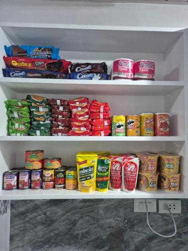 a refrigerator filled with lots of food and drinks at Casitas Veyra in Norte