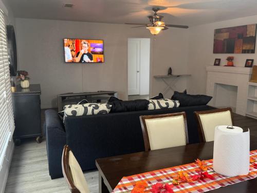 a living room with a couch and a table at Reyes Guess home in Marysville