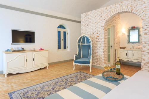Μια τηλεόραση ή/και κέντρο ψυχαγωγίας στο Flamingo Hotel & Spa - Pet Friendly