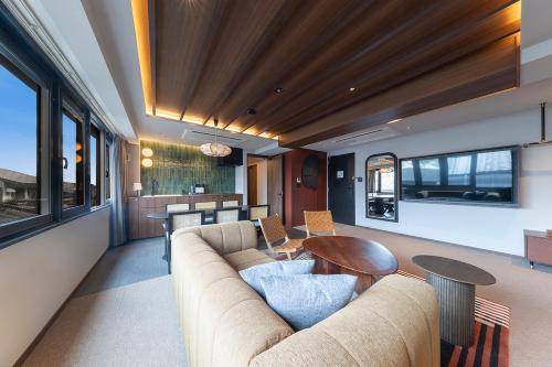 TV a/nebo společenská místnost v ubytování STITCH HOTEL Kyoto