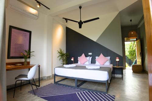 Ένα ή περισσότερα κρεβάτια σε δωμάτιο στο Makahiya Fitness Boutique Hotel