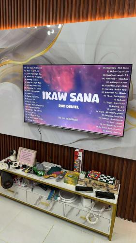 a sign for a new santa display in a store at Windmill Bliss in Pililla