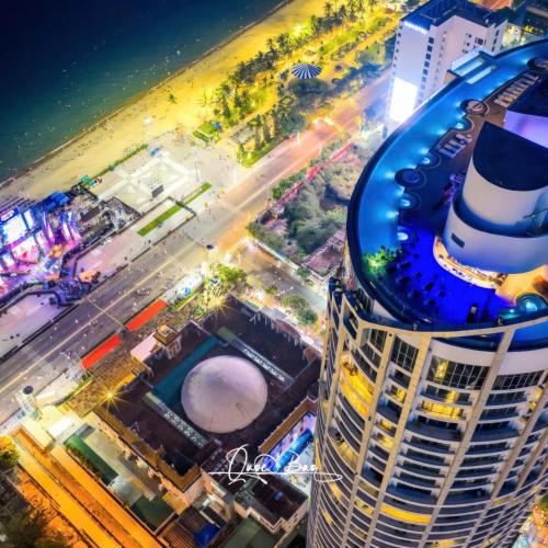 an overhead view of a building with a swimming pool at MAISON SEAFRONT RESIDENCE Nha Trang in Nha Trang