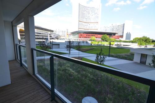 a balcony with a view of the city at Apartment with parking on premise in Vienna