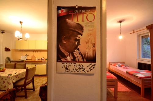 a living room with a movie poster on the wall at Guest House Konjic in Konjic