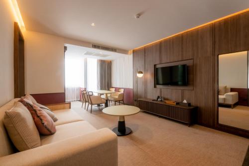 TV a/nebo společenská místnost v ubytování Hotel MOCO