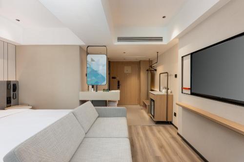 TV a/nebo společenská místnost v ubytování Holiday Inn Express Guiyang Downtown by IHG