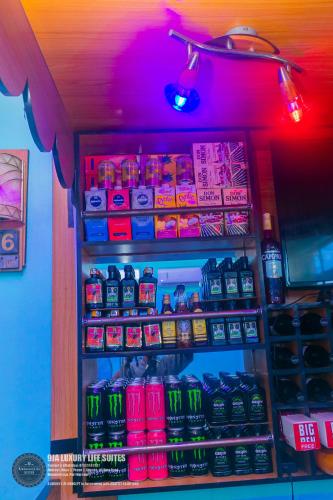a refrigerator filled with lots of food and drinks at 9ja Luxury Life Suites in Port Harcourt