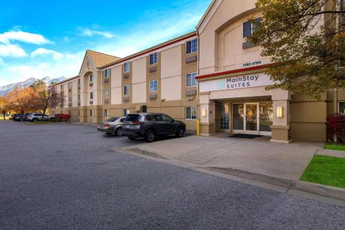 a parking lot in front of a hotel at MainStay Suites Salt Lake City Fort Union in Midvale
