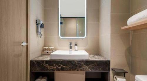 Un baño de Home Inns Plus Shanghai Xujiahui Branch
