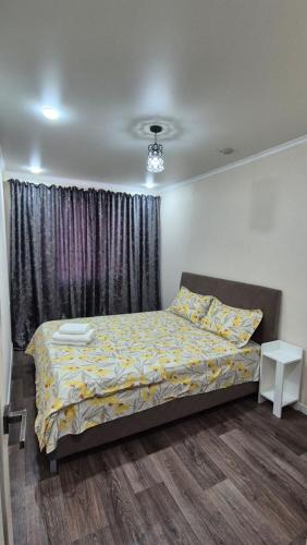 Ένα ή περισσότερα κρεβάτια σε δωμάτιο στο Abek Apartments