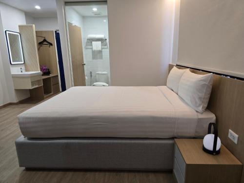 Katil atau katil-katil dalam bilik di House Hotel Pattaya Sai 3