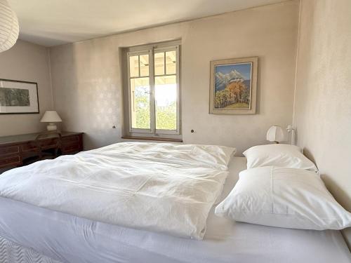 Postel nebo postele na pokoji v ubytování Chalet in Villars-sur-Ollon
