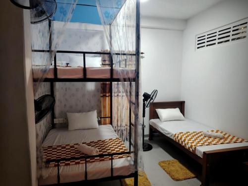 Camera con 2 Letti a Castello di Sandila Surf and Stay - Hiriketiya a Dikwella