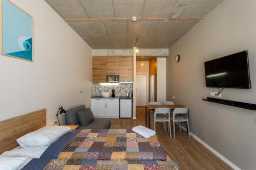 Η κουζίνα ή μικρή κουζίνα στο Redco Alpic New Gudauri - Ziggy Apartment