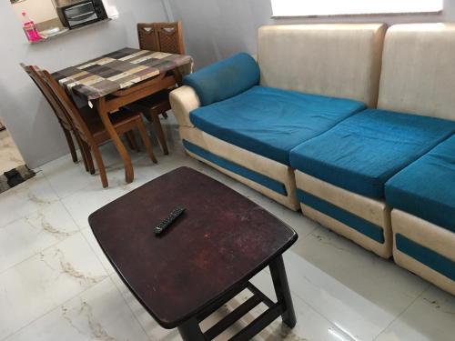 Coin salon dans l'établissement Golden Gate 2bhk Serviced Apartment Mangadu