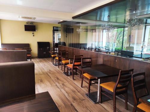 Χώρος καθιστικού στο Krishna Inn - Royal Hotels