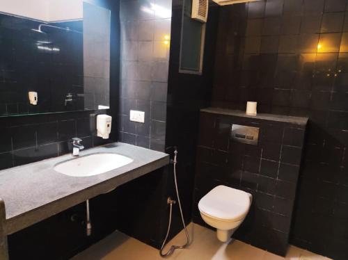 Ένα μπάνιο στο Krishna Inn - Royal Hotels
