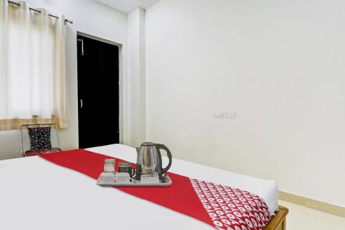 Postel nebo postele na pokoji v ubytování Hotel O S D Palace