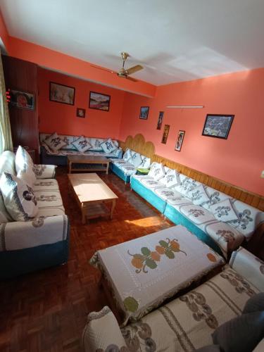 Postel nebo postele na pokoji v ubytování Malis Apple Lodge homestay