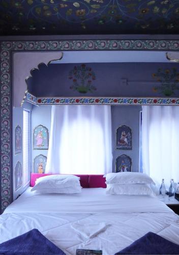 Katil atau katil-katil dalam bilik di Island Tower Boutique Hotel