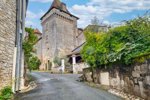 an empty street in an old stone building at Gite Le Pont in Varaignes