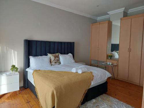Katil atau katil-katil dalam bilik di Eight Martjie Bed & Breakfast