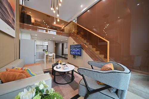 Khu vực ghế ngồi tại 广州和悦国际公寓琶洲会展中心店