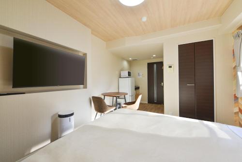 Televisyen dan/atau pusat hiburan di Hotel New Gaea Yakuin