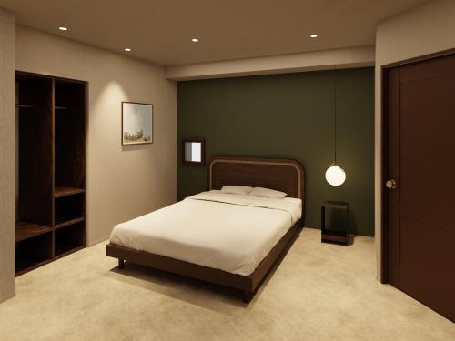 Ένα ή περισσότερα κρεβάτια σε δωμάτιο στο TRANSCENDER HOTEL Yokohama