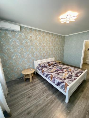 Postel nebo postele na pokoji v ubytování FlatService Апартаменти в сучасному ЖК Parklend