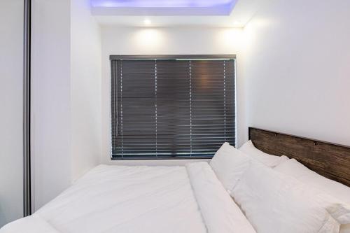 Katil atau katil-katil dalam bilik di The Icons Lounge - Exclusive Penthouse in Fourways with Pool Table