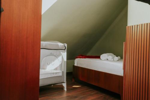 Postel nebo postele na pokoji v ubytování Thea Hotel