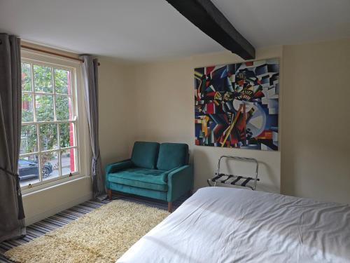 Postel nebo postele na pokoji v ubytování Family room 2 - The Unicorn Hotel