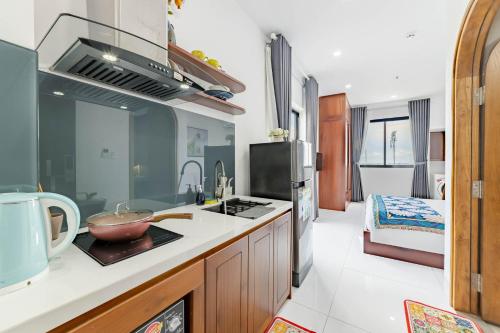 Dapur atau dapur kecil di MTR Apartment & Hotel
