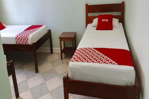 Postel nebo postele na pokoji v ubytování OYO Hotel Cosmópolis, Sao Paulo