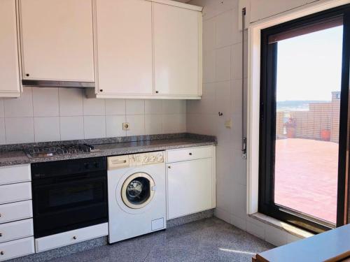 Küche/Küchenzeile in der Unterkunft Apartamento Ruy Belo - Foz