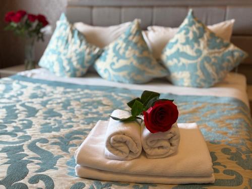 Ένα ή περισσότερα κρεβάτια σε δωμάτιο στο Hotel Romanita