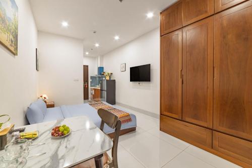 Televisyen dan/atau pusat hiburan di MTR Apartment & Hotel