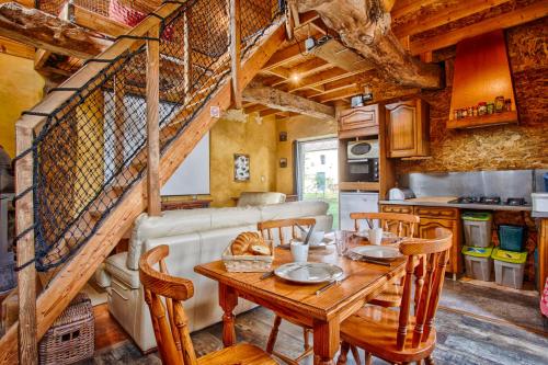 Foto L'Apto - Gîtes à la ferme - Jardin avec plancha 4