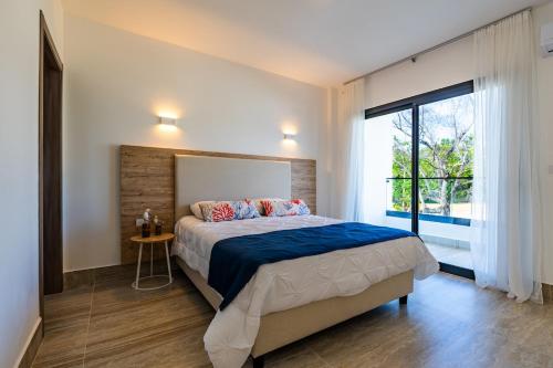 Postel nebo postele na pokoji v ubytování La Stuga del Mar - Walk to Portillo Beach, Terrenas