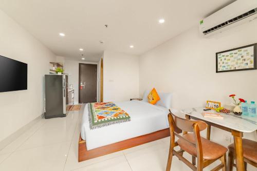 Televisyen dan/atau pusat hiburan di MTR Apartment & Hotel