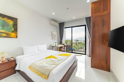 Katil atau katil-katil dalam bilik di MTR Apartment & Hotel