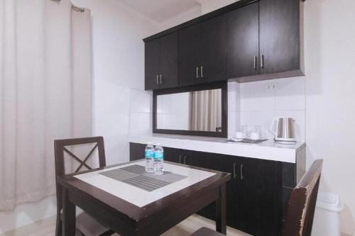 Kuchyň nebo kuchyňský kout v ubytování Propiedad Residences Makati