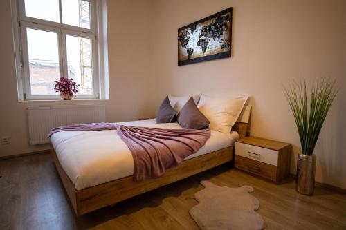 Ένα ή περισσότερα κρεβάτια σε δωμάτιο στο Cozy flat in center