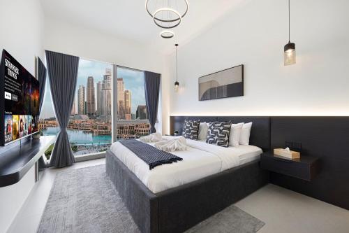 Luxury Grande Suites by Hostiva - Full Burj Khalifa Viewにあるベッド