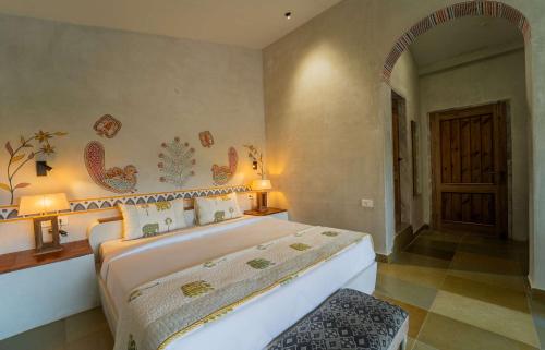 Ein Bett oder Betten in einem Zimmer der Unterkunft Tehla Bagh